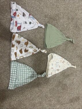 Bundle of baby beanie top knot hats